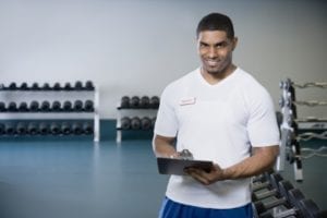 Male personal trainer at gym